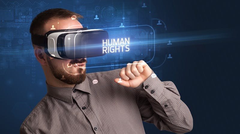 img 1: “Human rights – Uomo con indosso visore VR”